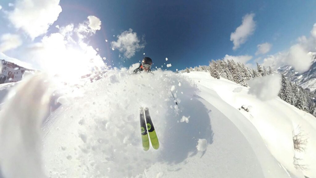 Skiing down mountain